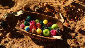 Resin quandong and Eucalyptus seed beads, Ikuntji Artists, 2014, photo: Dan Coutts